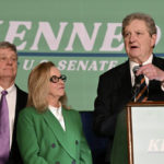 
              Sen. John Kennedy, joined by his wife, Becky, left, addresses supporters during his election night party, Tuesday, Nov. 8, 2022, at the Lod Cook Alumni Center on the campus of LSU in Baton Rouge, La. (Hilary Scheinuk/The Advocate via AP)
            