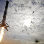 
              A SpaceX Falcon Heavy rocket's two side boosters, left and rear center, return to Cape Canaveral for landing about eight minutes after liftoff in Cape Canaveral, Fla., Tuesday, Nov. 1, 2022. SpaceX launched its mega Falcon Heavy rocket for the first time in more than three years Tuesday, hoisting satellites for the military and then nailing side-by-side booster landings back near the pad. (AP Photo/John Raoux)
            