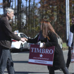 
              Republican candidate for governor, Bob Stefanowski, left, greets Brianna Timbre, a candidate for the state House of Representatives, while doing some last minute campaigning at the Pitkin Community Center in Wethersfield, Conn, on Election Day, Tuesday, Nov. 8, 2022. (Cloe Poisson/Hartford Courant via AP)
            