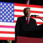 
              Former President Donald Trump speaks at a campaign rally in support of the campaign of Ohio Senate candidate JD Vance at Wright Bros. Aero Inc. at Dayton International Airport on Monday, Nov. 7, 2022, in Vandalia. (AP Photo/Michael Conroy)
            