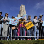 
              A crowd gathers for a rally in support of Pennsylvania Lt. Gov. John Fetterman, a Democratic candidate for U.S. Senate, with former President Barrack Obama in Pittsburgh, Saturday, Nov. 5, 2022. The Cathedral of Learning on the University of Pittsburgh campus is seen in the background. (AP Photo/Gene J. Puskar)
            