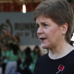 
              FILE - Scotland's First Minister Nicola Sturgeon speaks to members of the media at the finish line of the Running Out Of Time climate relay, which arrived from Glasgow, Scotland, after 40 days through 18 countries to reach the COP27 U.N. Climate Summit, at the Park Regency Hotel on Tuesday, Nov. 8, 2022, in Sharm el-Sheikh, Egypt. Women are controlling negotiations about the thorniest topic in the United Nations climate talks in Egypt. The issue is of reparations for climate disasters and payments from polluting nations to damaged countries. (AP Photo/Thomas Hartwell, File)
            