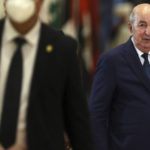 
              Algerian president Abdelmadjid Tebboune, centre, arrives to attend the Arab Summit, in Algiers, Algeria, Tuesday, 1 Nov., 2022. Arab leaders are meeting in Algeria at the 31st summit of the Arab League. They're seeking common ground on divisive issues in the region with the backdrop of rising inflation, food and energy shortages, drought and soaring cost of living across the Middle East and Africa. The 22-member League last held its summit in 2019. (AP Photo/Anis Belghoul)
            