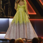 
              Carrie Underwood performs a tribute to the late singer Loretta Lynn during the 56th Annual CMA Awards on Wednesday, Nov. 9, 2022, at the Bridgestone Arena in Nashville, Tenn. (AP Photo/Mark Humphrey)
            