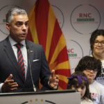 
              CORRECTS DATE TO AUG. 19, 2022, INSTEAD OF OCT. 18, 2022 - Juan Ciscomani, Republican U.S. House candidate, 6th District, speaks at the RNC Hispanic Community Center, in Tucson, Ariz., Aug. 19, 2022. Arizona's only open congressional seat has featured some buzzwords spoken by candidates on both sides: extreme and the American dream. Ciscomani says he's living the American dream as someone who became a naturalized U.S. citizen. Democrat Kirsten Engel says she's trying to renew the American dream by fighting against a pre-statehood ban on abortion in Arizona. (Rick Wiley/Arizona Daily Star via AP)
            