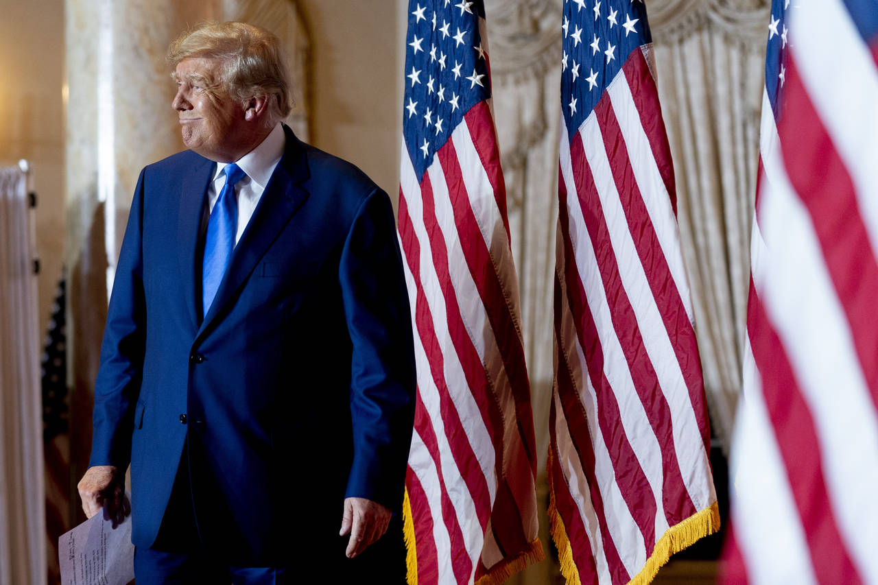 Former President Donald Trump takes the stage to speak at Mar-a-lago on Election Day, Tuesday, Nov....