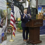 
              White House senior adviser Mitch Landrieu speaks in a repurposed railroad depot in Elm City, N.C., during an event to announce rural broadband funding on Thursday, Oct. 27, 2022. AccessOn Networks will receive $17.5 million to connect communities, businesses, farms and educational facilities to high-speed internet. (AP Photo/Allen G. Breed)
            
