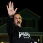 
              Richard Fierro gestures while speaking during a news conference outside his home about his efforts to subdue the gunman in Saturday's shooting at Club Q, Monday, Nov. 21, 2022, in Colorado Springs, Colo. (AP Photo/Jack Dempsey)
            