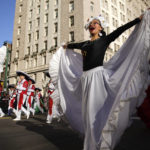 
              Performers make their way down Central Park West during the Macy's Thanksgiving Day Parade, Thursday, Nov. 24, 2022, in New York. (AP Photo/Julia Nikhinson)
            