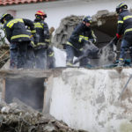 
              A lifeless dog is extracted from under the debris of a collapsed house in Casamicciola, on the southern Italian island of Ischia, Monday, Nov. 28, 2022. Exceptionally heavy rain caused a chunk of Mount Epomeo to come crashing down before dawn on Saturday, gaining speed as it entered the populated port town of Casamicciola, where it demolished buildings and carried cars and buses into the sea leaving at least eight people dead and more missing. Some 30 houses were inundated by the mud and water, and more than 200 residents in the town of 8,300 remain homeless, according to officials. (AP Photo/Salvatore Laporta)
            