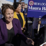 
              Massachusetts Attorney General and Democratic candidate for Gov. Maura Healey, front, and Democratic Lt. Gov. candidate Kim Driscoll, behind center, greet supporters during a campaign stop, Monday, Nov. 7, 2022, in Boston's East Boston neighborhood. (AP Photo/Steven Senne)
            