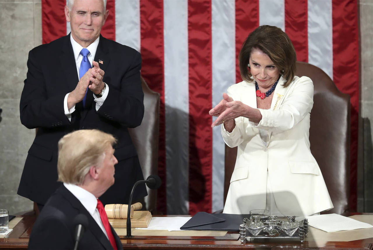 FILE - President Donald Trump turns to House Speaker Nancy Pelosi of Calif., as he delivers his Sta...
