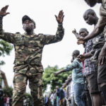 
              Democratic Republic of the Congo youth get the first steps of basic military training in Goma, eastern Congo, Monday, Nov. 7, 2022. More than 3,000 new Congolese military recruits began training Monday as the army steps up its fight against the M23 rebels in the country's east that the government alleges are backed by neighboring Rwanda. (AP Photo/Moses Sawasawa)
            