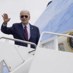 
              President Joe Biden waves before boarding Air Force One for a trip to Florida to deliver a speech on Medicare and social security, and attend political functions, Tuesday, Nov. 1, 2022, in Andrews Air Force Base, Md. (AP Photo/Evan Vucci)
            
