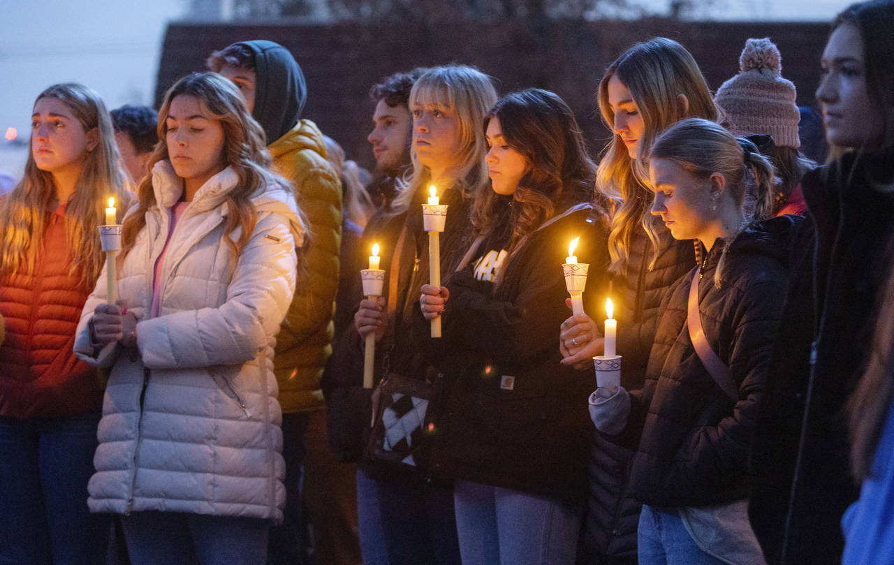 Boise State University students, along with people who knew the four University of Idaho students w...