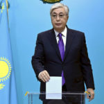 
              In this handout photo released by Kazakhstan's President Press Office, Kazakhstan's President Kassym-Jomart Tokayev casts his ballot at a polling station in Astasna, Kazakhstan, Sunday, Nov. 20, 2022. Tokayev appears certain to win a new term against little-known challengers in a snap election on Sunday. Five candidates are on the ballot against President Kassym-Jomart Tokayev, who faced a bloody outburst of unrest early this year and then moved to marginalize some of the Central Asian country's longtime powerful figures. (Kazakhstan's President Press Office via AP)
            