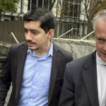 
              Michael DiMassa, left, and his lawyer, John Gulash, leave federal court, Tuesday, Nov. 1, 2022, in Hartford, Conn. DiMassa, a former state representative, pleaded guilty Tuesday to wire fraud conspiracy charges in connection with the theft of about $1.2 million in federal coronavirus relief funds from the city of West Haven, Conn. (AP Photo/Dave Collins)
            