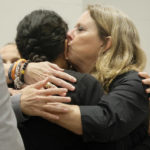 
              Debbie Hixon, right, kisses her daughter-in-law, Ines Hixon, after she gave a victim impact statement in the sentencing hearing for Marjory Stoneman Douglas High School shooter Nikolas Cruz at the Broward County Courthouse in Fort Lauderdale, Fla. on Tuesday, Nov. 1, 2022. Debbie Hixon's husband, Christopher, was killed in the 2018 shootings. Cruz was sentenced to life in prison for murdering 17 people at Parkland's Marjory Stoneman Douglas High School more than four years ago. (Amy Beth Bennett/South Florida Sun Sentinel via AP, Pool)
            