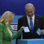 
              Likud party chairman Benjamin Netanyahu and his wife 'Sara cast their ballots during Israeli elections in Jerusalem, Tuesday, Nov. 1, 2022. (AP Photo/Maya Alleruzzo)
            