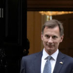 
              Britain's Chancellor Jeremy Hunt leaves 11 Downing Street to attend Parliament in London, Thursday, Nov. 17, 2022. Just three weeks after taking office, British Prime Minister Rishi Sunak faces the challenge of balancing the nation's budget while helping millions of people slammed by a cost-of-living crisis. Treasury chief Jeremy Hunt will deliver the government's plan for tackling a sputtering economy in a speech to the House of Commons on Thursday. (AP Photo/Alastair Grant)
            