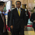 
              Thailand's Prime Minister Prayuth Chan-ocha, middle, arrives for the ASEAN summit in Phnom Penh, Cambodia, Friday, Nov. 11, 2022. 2022. The ASEAN summit kicks off a series of three top-level meetings in Asia, with the Group of 20 summit in Bali to follow and then the Asia Pacific Economic Cooperation forum in Bangkok. (AP Photo/Anupam Nath)
            