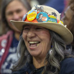 
              Democratic party supporter Carmel Martinez laughs while waiting for President Joe Biden at a campaign rally in Albuquerque, N.M., Thursday, Nov. 3, 2022 (AP Photo/Andres Leighton)
            