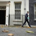 
              Britain's Chancellor Jeremy Hunt leaves 11 Downing Street to attend Parliament in London, Thursday, Nov. 17, 2022. Just three weeks after taking office, British Prime Minister Rishi Sunak faces the challenge of balancing the nation's budget while helping millions of people slammed by a cost-of-living crisis. Treasury chief Jeremy Hunt will deliver the government's plan for tackling a sputtering economy in a speech to the House of Commons on Thursday. (AP Photo/Alastair Grant)
            