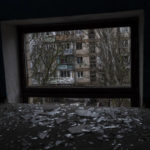 
              Broken glass lay on the floor of a building damaged during a Russian strike in Kherson, southern Ukraine, Friday, Nov. 25, 2022. (AP Photo/Bernat Armangue)
            