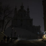 
              This photo shows a city center during a blackout after a Russian rocket attack in Kyiv, Ukraine, Wednesday, Nov. 23, 2022. Russia unleashed a new missile onslaught on Ukraine's battered energy grid Wednesday, robbing cities of power and some of water and public transport, too, compounding the hardship of winter for millions. The aerial mauling of power supplies also took nuclear plants and internet links offline and spilled blackouts into neighbor Moldova. (AP Photo/Andrew Kravchenko)
            