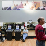 
              A voter waits in line as Ohio voters cast their ballots in a fitness studio at the Everybody Fitness Center in Dayton, Ohio Tuesday, Nov. 8, 2022. (AP Photo/Michael Conroy)
            