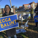 
              Becca Balint, a Democratic candidate for the U.S. House for Vermont, stands outside the Brattleboro, Vt., polling station located at the American Legion during the midterm elections on Tuesday, Nov. 8, 2022. (Kristopher Radder/The Brattleboro Reformer via AP)
            