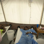 
              Patients with cholera symptoms lie on beds as they receive serum at a clinic run by Doctors Without Borders, in Port-au-Prince, Haiti, Friday, Nov. 11, 2022. (AP Photo/Odelyn Joseph)
            