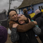 
              In the village of Tsentralne, Ukrainian family members reunite for the first time since Russian troops withdraw from the Kherson region, southern Ukraine, Sunday, Nov. 13, 2022. Ukraine's retaking of Kherson was a significant setback for the Kremlin and it came some six weeks after Russian President Vladimir Putin annexed the Kherson region and three other provinces in southern and eastern Ukraine — in breach of international law — and declared them Russian territory. (AP Photo/Bernat Armangue)
            