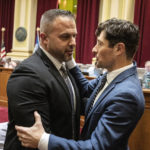 
              Brian O'Hara, left, was congratulated by Mayor Jacob Frey, in the City Hall, Council chambers in Minneapolis on Thursday Nov 3, 2022. O'Hara, deputy mayor of Newark, was introduced as Mayor Jacob Frey's top pick Thursday. If confirmed by the City Council, O'Hara will lead the department through changes expected to be ordered as the result of an ongoing Department of Justice investigation launched after the police killing of George Floyd. (Jerry Holt /Star Tribune via AP)
            