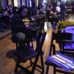 
              A supporter waits for Wisconsin Democratic U.S. Senate candidate Mandela Barnes to speak at his election night party early Wednesday, Nov. 9, 2022, in Milwaukee. (AP Photo/Morry Gash)
            