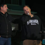 
              Richard Fierro talks outside his home about his efforts to subdue the gunman in Saturday's fatal shooting at Club Q as his brother Ed Fierro stands by for support during a news conference Monday, Nov. 21, 2022, in Colorado Springs, Colo. (AP Photo/Jack Dempsey)
            