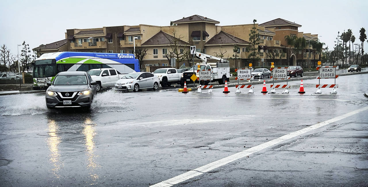The westbound lanes of Foothill Blvd. between Cactus and Cedar Avenues are closed because flooding ...
