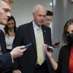 
              Sen. Ron Johnson, R-Wis., speaks with members of the press during votes on a bill that would enshrine same-sex and interracial marriages into federal law, Wednesday, Nov. 16, 2022, on Capitol Hill in Washington. (AP Photo/Patrick Semansky)
            
