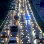 
              Cars and trucks queue in traffic on a highway in Frankfurt, Germany, Wednesday, Nov. 9, 2022. (AP Photo/Michael Probst)
            