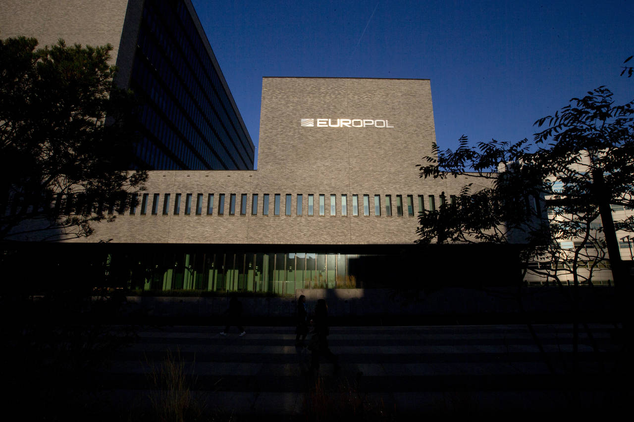 FILE- This Wednesday, Oct. 10, 2018, file photo shows the sun bouncing off the Europol headquarters...