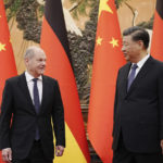 
              German Chancellor Olaf Scholz, left, meets Chinese President Xi Jinping at the Great Hall of People in Beijing, China, Friday, Nov. 4, 2022. (Kay Nietfeld/Pool Photo via AP)
            