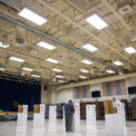 
              A man votes in the gym inside Walker-Grant Middle School in Fredericksburg, Va., on Election Day, Tuesday, Nov. 8, 2022. (Tristan Lorei/The Free Lance-Star via AP)
            