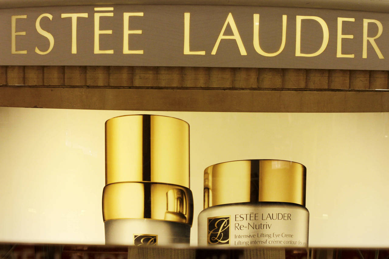 FILE - In this Nov. 2, 2011 file photo, Estee Lauder products are displayed at a department store i...