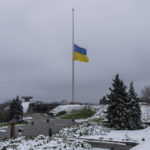 
              The Ukrainian flag flatters at half mast near the Ukrainian Motherland monument in Kyiv, Ukraine, Tuesday, Nov. 29, 2022. (AP Photo/Bernat Armangue)
            