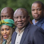 
              South African President Cyril Ramaphosa, center, leaves an African National Congress (ANC) national executive committee meeting in Johannesburg, South Africa, Monday Dec. 5, 2022. Ramaphosa might lose his job, and his reputation as a corruption fighter, as he faces possible impeachment over claims that he tried to cover up the theft of millions of dollars stashed inside a couch on his farm. (AP Photo/Jerome Delay)
            