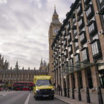 
              An ambulance is parked outside Portcullis House, backdropped by the Elizabeth Tower, commonly known as Big Ben, in London, Thursday, Dec. 1, 2022. Some 10000 ambulance staff have voted to strike over pay and working conditions, along with a possible 100,000 nurses going on strike on Dec1. 5, leading the Government to set up contingency plans to cope with a wave of walkouts with Cabinet Minister Oliver Dowden in charge. (AP Photo/Alberto Pezzali)
            