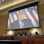 
              A video of former President Donald Trump is shown on a screen, as the House select committee investigating the Jan. 6 attack on the U.S. Capitol holds its final meeting on Capitol Hill in Washington, Monday, Dec. 19, 2022. (AP Photo/J. Scott Applewhite)
            