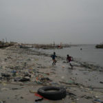 
              FILE - Boys play soccer among trash that litters the sand of Yarakh Beach in Dakar, Senegal, Nov. 8, 2022. Reducing waste while boosting recycling and reuse, known as the ‘circular economy,’ will be vital for halting the loss of nature, organizers of the World Circular Economy Forum said Wednesday, Dec. 7.  (AP Photo/Leo Correa, File)
            