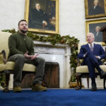 
              Ukrainian President Volodymyr Zelenskyy speaks as he meets with President Joe Biden in the Oval Office of the White House, Wednesday, Dec. 21, 2022, in Washington. (AP Photo/Patrick Semansky)
            