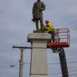 
              Workers remove the bronze statue of Confederate Lieutenant General A.P. Hill on Monday Dec. 12, 2022 in Richmond, Va. (AP Photo/John C. Clark)
            